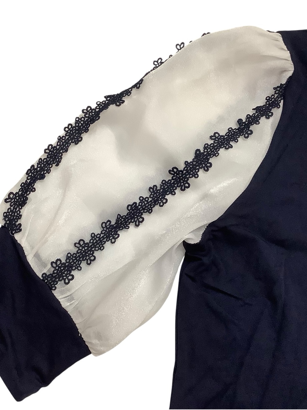Gracia Navy Knit Top with White Sheer Lace Puff Sleeves - Picture 4 of 9